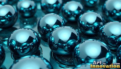Reflecting bright light, polished teal ball bearings rest on a smooth surface