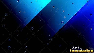 Round clear water drops rest over sharp diagonal stripes of cyan and dark blue