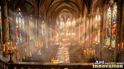 Cathedral hall with sunlight shining through stained glass windows