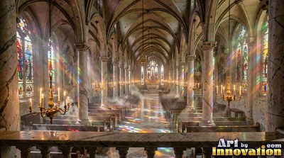In a stone cathedral, colored light shines past tall pillars and wooden pews
