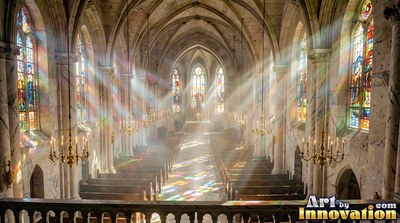 A stone cathedral fills with bright sunbeams pouring through stained-glass panels windows