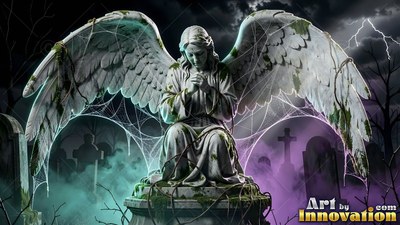 In a graveyard in the fog, a stone angel statue kneels with folded hands under cobwebs