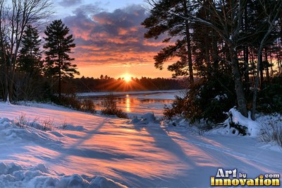 Calm ocean sunset with a long glowing reflection on the water