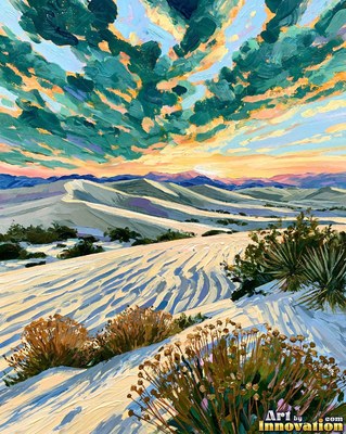Desert dunes under a blazing sunset sky