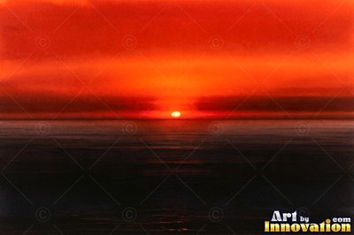 Stormy sea at sunset with scarlet light breaking through dark clouds