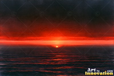 Desert dunes under a blazing sunset sky