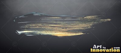 Against a dark gray background, a streak of brushed metallic gold paint sweeps across