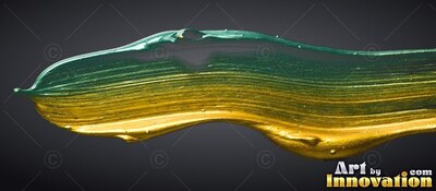 A thick streak of green and glossy gold paint on a black background