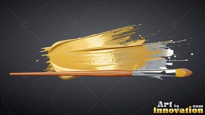 A paintbrush rests beneath a thick swipe of glossy gold paint that catches bright light