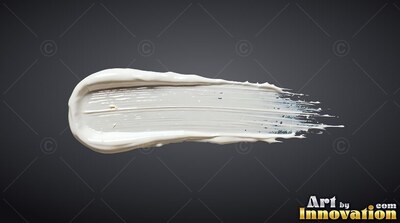 A thick stroke of white cream spreads across a dark gray surface, catching soft light on its ridges