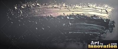 Thick metallic silver paint curves across a dark surface under a cool top light
