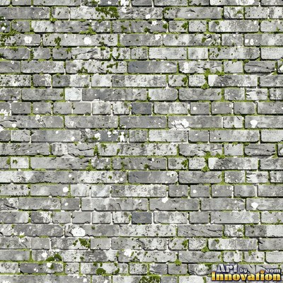 Painted charcoal brick with the paint worn off the edges, a full frame wall texture