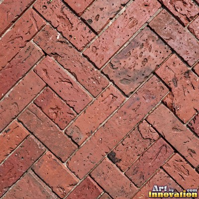 Salmon pink brick laid in a neat stack bond grid, soft even light across the wall