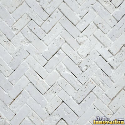 Painted charcoal brick with the paint worn off the edges, a full frame wall texture