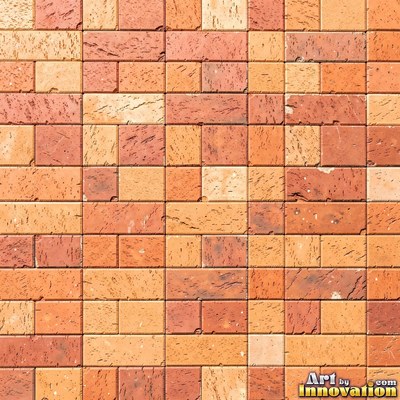 Salmon pink brick laid in a neat stack bond grid, soft even light across the wall