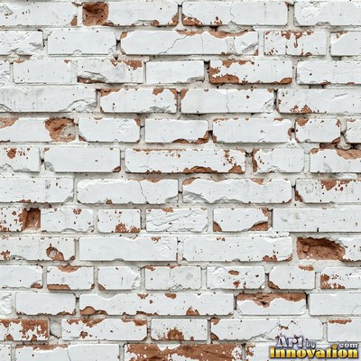 Painted charcoal brick with the paint worn off the edges, a full frame wall texture