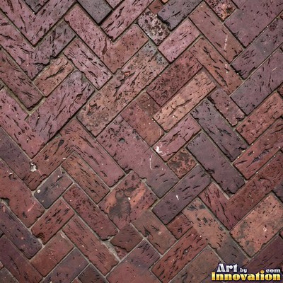 Weathered red brick wall with chipped corners and crumbling mortar, shot flat and evenly lit