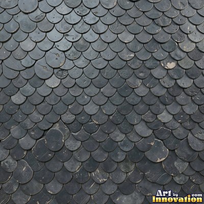 Charcoal glazed rectangular tiles laid in a herringbone pattern, flat front view