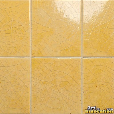 Charcoal glazed rectangular tiles laid in a herringbone pattern, flat front view