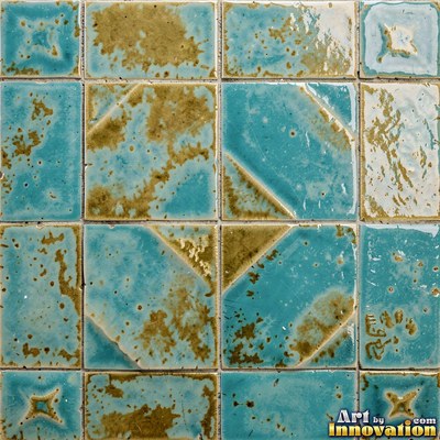 Old chipped yellow tiles with darkened grout lines filling the frame
