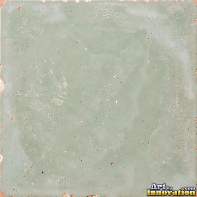 Old chipped yellow tiles with darkened grout lines filling the frame