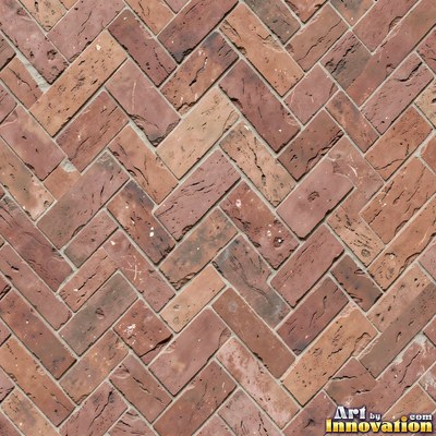 Charcoal glazed rectangular tiles laid in a herringbone pattern, flat front view