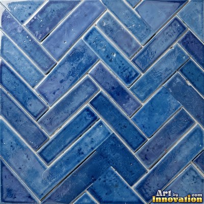 Charcoal glazed rectangular tiles laid in a herringbone pattern, flat front view