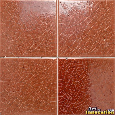 Charcoal glazed rectangular tiles laid in a herringbone pattern, flat front view