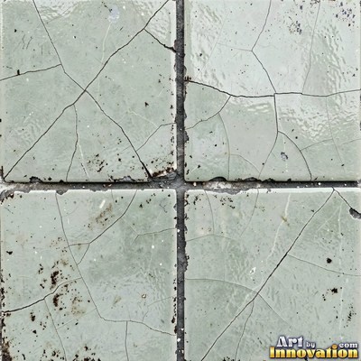 Matte sage green terracotta tiles with soft worn edges under even daylight