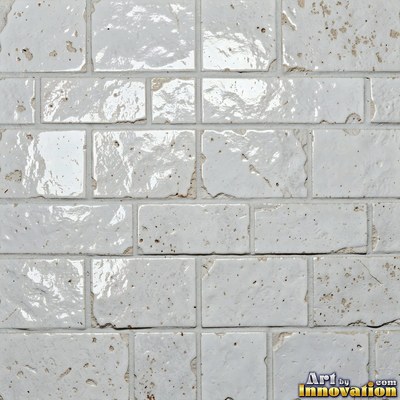 Charcoal glazed rectangular tiles laid in a herringbone pattern, flat front view