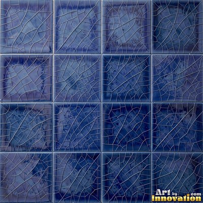 Charcoal glazed rectangular tiles laid in a herringbone pattern, flat front view