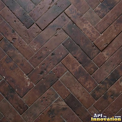 Charcoal glazed rectangular tiles laid in a herringbone pattern, flat front view