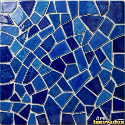 Roman style stone mosaic with a border pattern in whitewashed tones