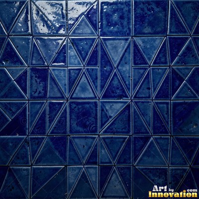Broken tile mosaic of irregular yellow shards set in gray grout