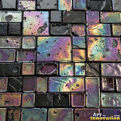 Broken tile mosaic of irregular yellow shards set in gray grout
