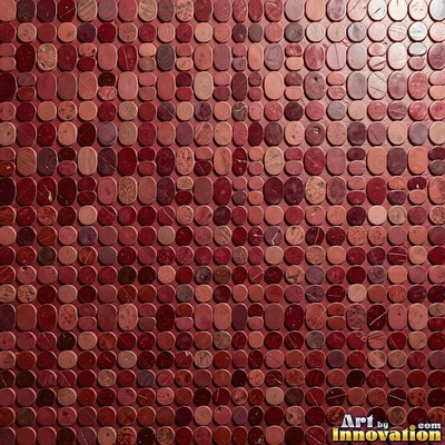 Broken tile mosaic of irregular yellow shards set in gray grout