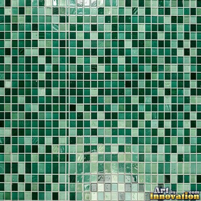 Broken tile mosaic of irregular yellow shards set in gray grout