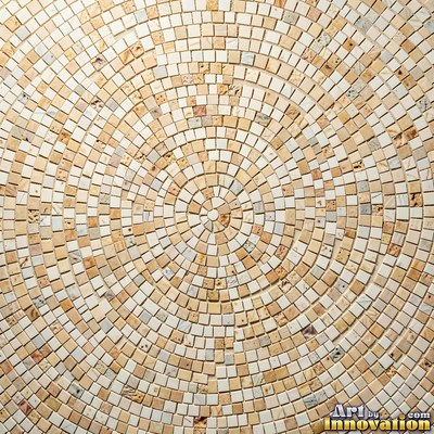 Broken tile mosaic of irregular yellow shards set in gray grout