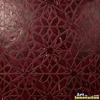 Roman style stone mosaic with a border pattern in whitewashed tones