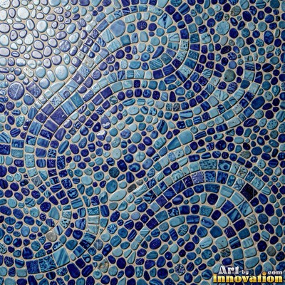 Roman style stone mosaic with a border pattern in whitewashed tones