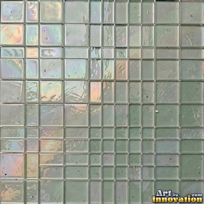 Roman style stone mosaic with a border pattern in whitewashed tones