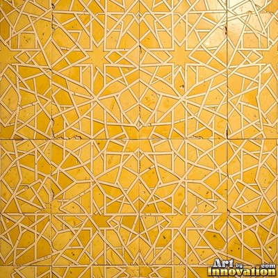 Roman style stone mosaic with a border pattern in whitewashed tones