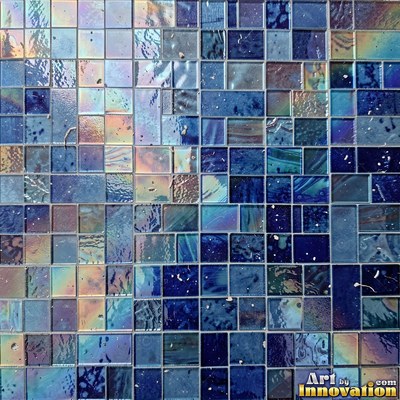Broken tile mosaic of irregular yellow shards set in gray grout