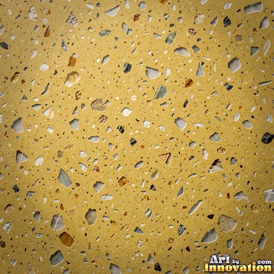 Minimal terrazzo with sparse chips on a smooth warm yellow base