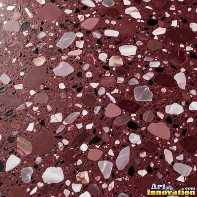 Minimal terrazzo with sparse chips on a smooth warm yellow base