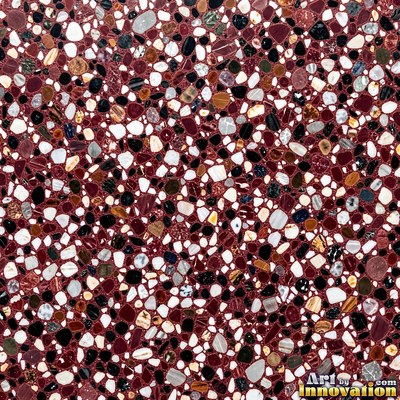 Polished terrazzo with small stone chips scattered evenly across a charcoal base