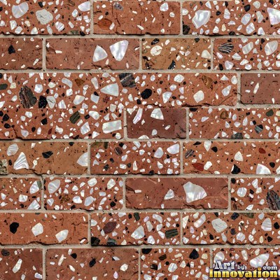 Black and white terrazzo flecked with mother of pearl, evenly lit