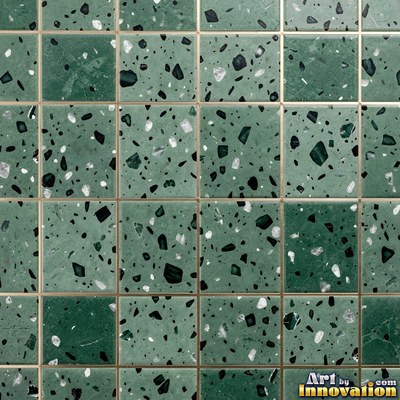 Polished terrazzo with small stone chips scattered evenly across a charcoal base