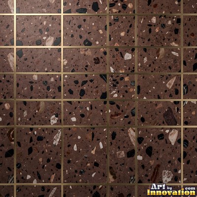 Black and white terrazzo flecked with mother of pearl, evenly lit