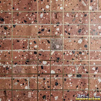 Cream and sand terrazzo set with large irregular stone fragments
